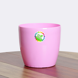 Glossy pink plastic basin.