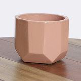 Ceramic basin in pink ribbed.