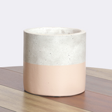 White and pink cement basin.
